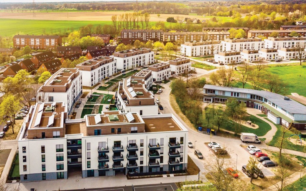 Die Umsetzung des Landeswettbewerbs Weckhoven: Das moderne Quartier an der Hülchrather Straße bietet mit 5,75 Euro/ qm bezahlbare Mietpreise für ihre Bewohner.v